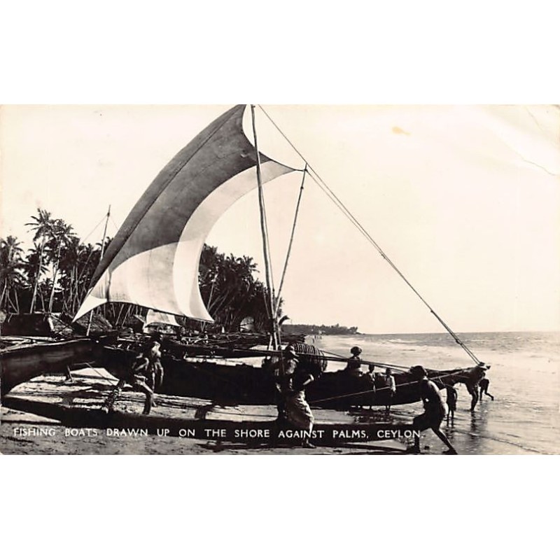 Sri Lanka - Fishing boats drawn up on the shore against palms - Publ. Plâté Ltd. 23